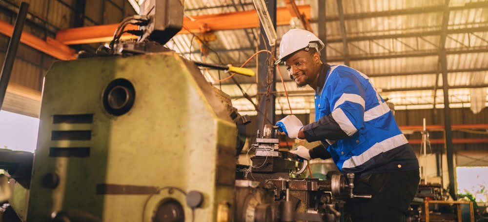 Production,Engineers,Are,Assisting,Adjusting,And,Maintaining,Factory,Machine,,Male
